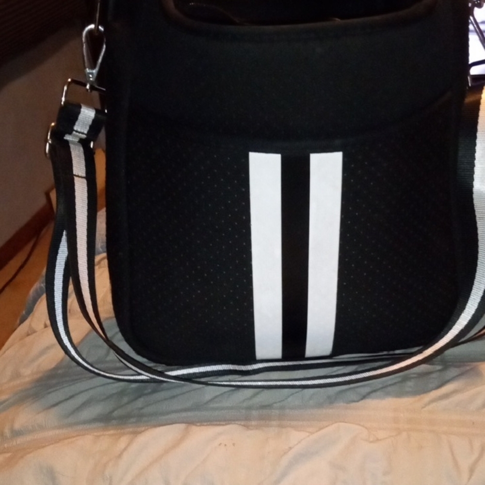 HAUTE SHORE Black Crossbody Bag with White Stripe Accents